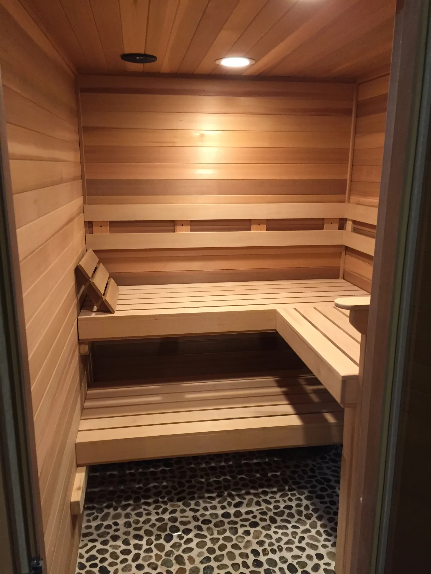 Modern sauna with full glass frontage