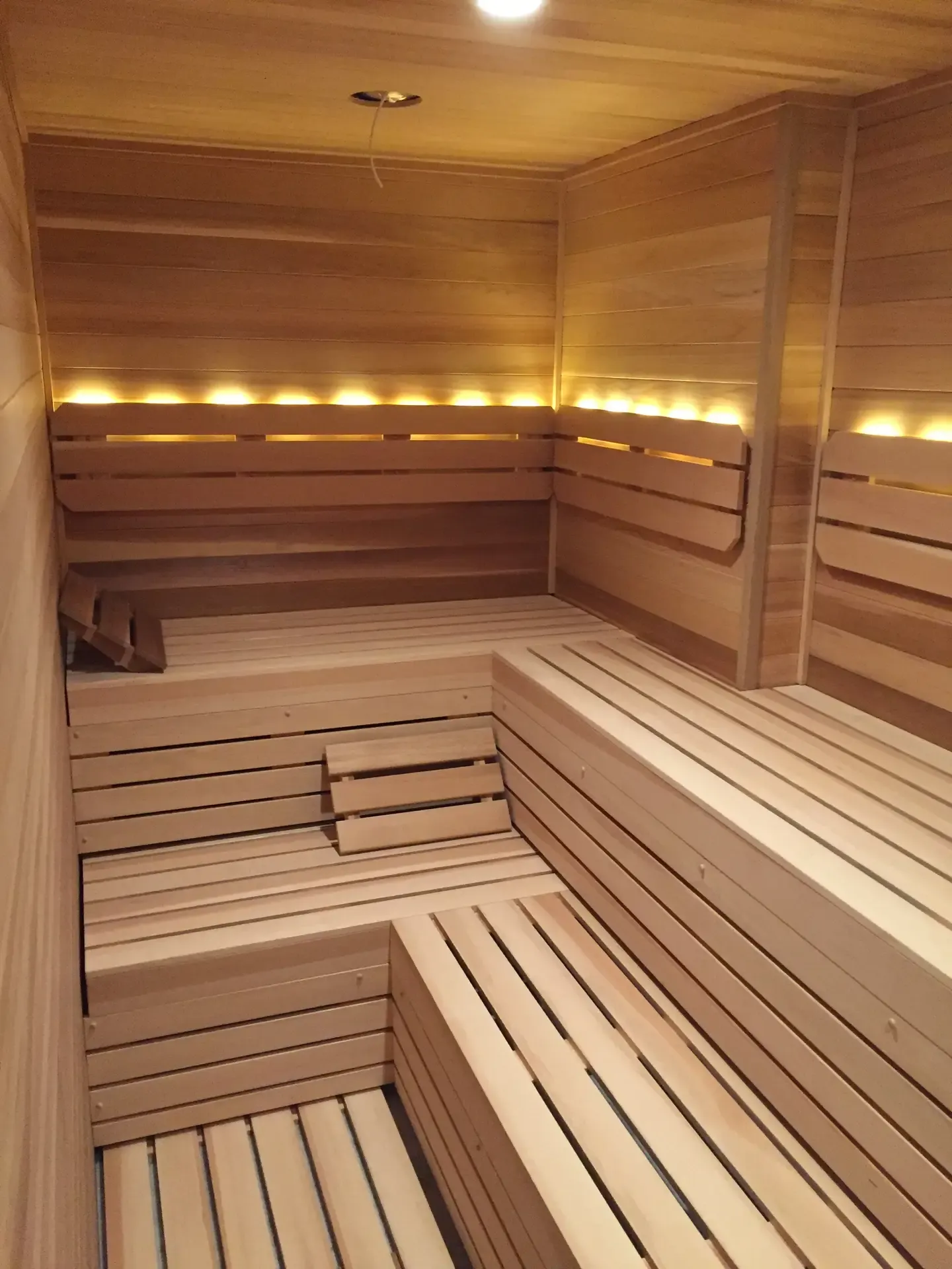 Professional custom sauna installation and structural framing in progress